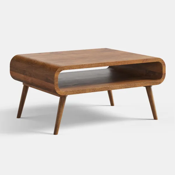 Gubbe coffee table in solid mango wood, side view, open shelf under top, on light studio background